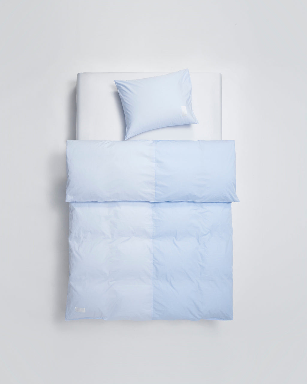 Wall Street pillow case | Light blue dots Jacquard